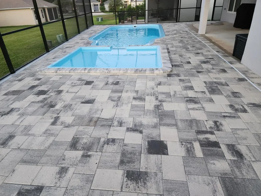 Pool and spa deck under a screen