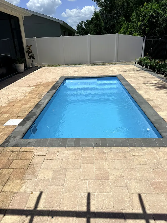Água e pavers, piscina Key West K5 em DeLand, FL