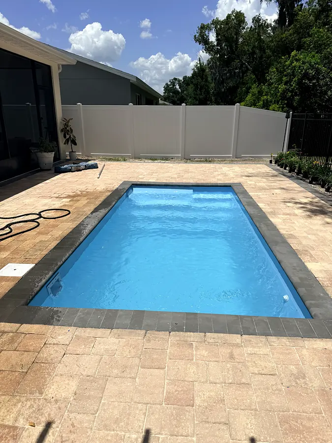 Água e pavers, piscina Key West K5 em DeLand, FL