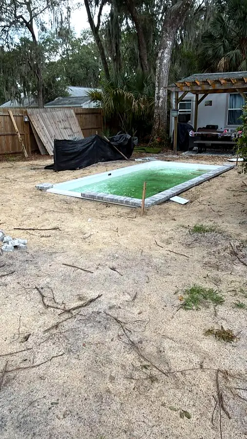 Borde y agua, piscina Key West K5 en Sanford, FL