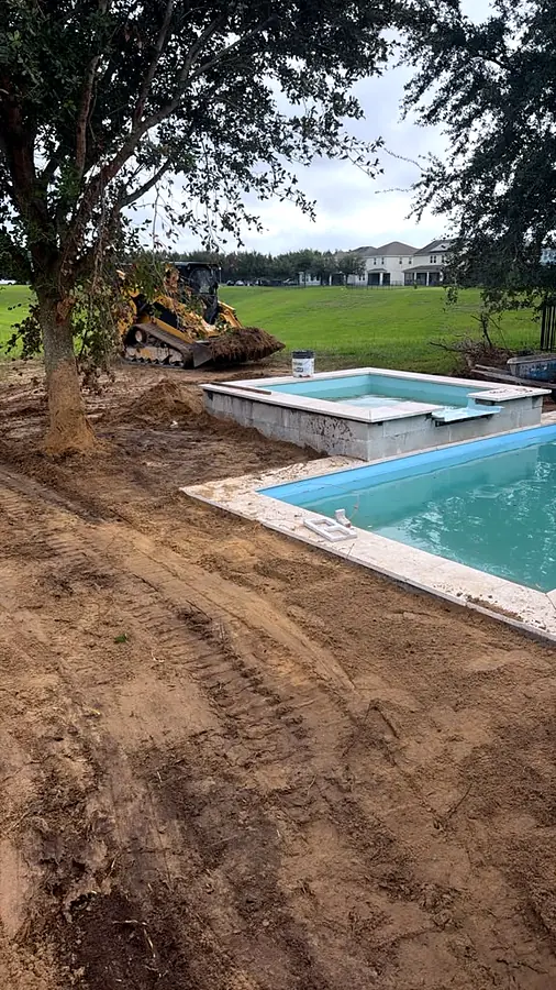 Pared del spa y pavers, piscina Key West K6 + spa en Winter Garden, FL